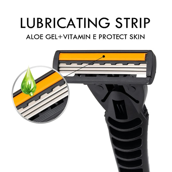 A close-up view of a black manual razor with an orange lubricating strip and a green aloe leaf detail.