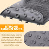 Gray silicone massage mat with suction cups designed to stay steady on shower floors and bathtubs