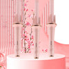 Three-speed negative ion automatic roll hair styling tool in pink and white.