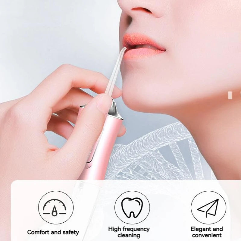 A hand is using a pink USB rechargeable dental flosser on a woman's lip for cleaning.