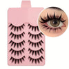 A pink cosmetic palette showing five pairs of dramatic manga style false eyelashes and a close-up of an eye with applied lash