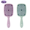 A pair of professional detangling hair brushes, one purple and one mint green.