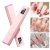 Pink handheld UV nail dryer lamp with multiple nail tips shown on fingers