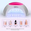 Lampe UV pour ongles blanche et rose éclairant une main appliquant du vernis gel.