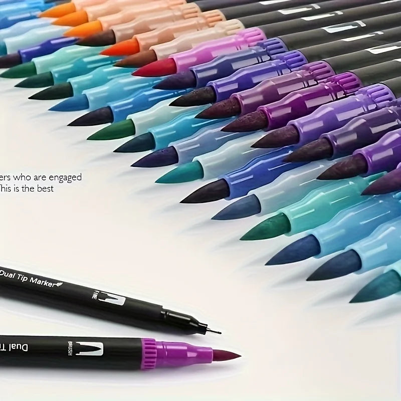 A row of 12 dual-tip art markers in various vibrant colors is displayed diagonally on a white surface.
