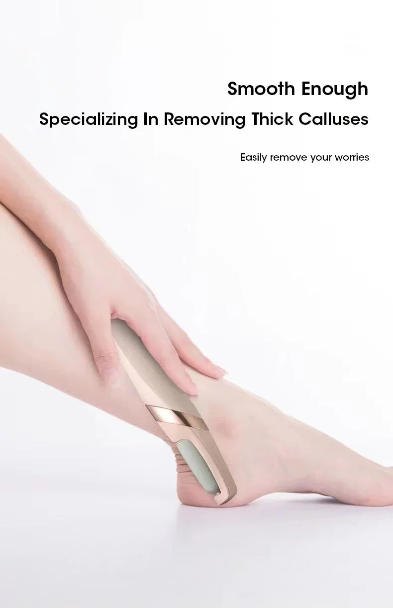 A hand is using a beige electric foot grinder on the sole of a foot for dead skin removal.
