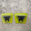 Two yellow plastic attachments for a precision electric beard trimmer