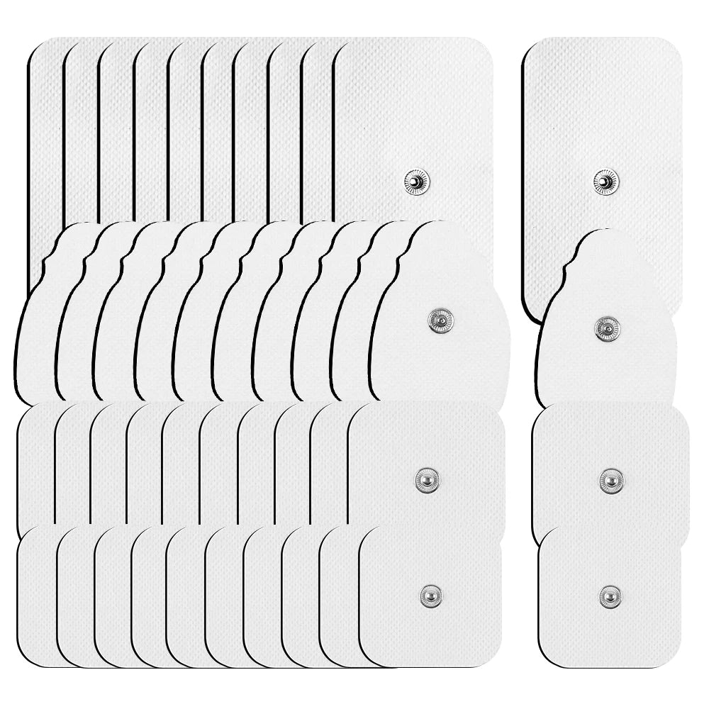 A set of white EMS muscle stimulator electrode pads arranged in multiple rows.