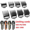 A set of black professional cordless hair trimmers with various guard attachments and a red and black box.