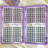 A pair of purple cosmetic palettes containing 320 piece Korean style eyelash clusters for DIY makeup