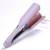 A purple professional electric curling iron with a rose gold barrel is shown in a side view.