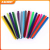 A collection of colorful dental orthodontic elastic ligature ties arranged in a row.