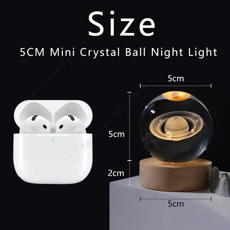 A white 5cm mini crystal ball night light resting on a wooden base.