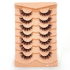 Un plateau de faux cils en fourrure de renard 3D dramatiques, couleur rose nude.