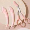 A set of pink precision eyebrow trimmers and scissors displayed on a light background.