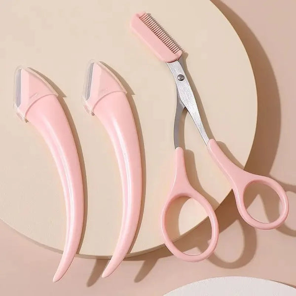A set of pink precision eyebrow trimmers and scissors displayed on a light background.