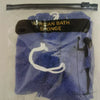 A dark blue exfoliating bath sponge is shown in a clear plastic bag.