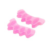 Pink silicone toe separators designed for foot and bunion relief.
