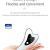 A hand holds a small, white microcurrent facial massager device designed for skin lifting.