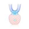 A pink ultrasonic electric toothbrush with a clear silicone head and a power button.