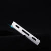 A silver stainless steel razor blade is shown diagonally against a black background with a blue light effect.