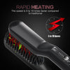 A close-up view of a black professional hair straightening comb with red heating elements.
