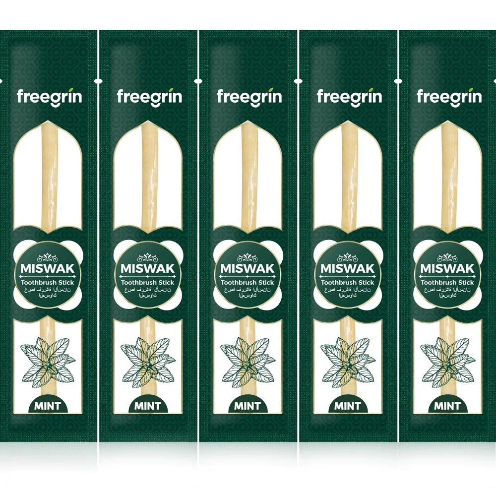 Pack of five green and white Miswak toothbrush sticks displayed in individual packaging.