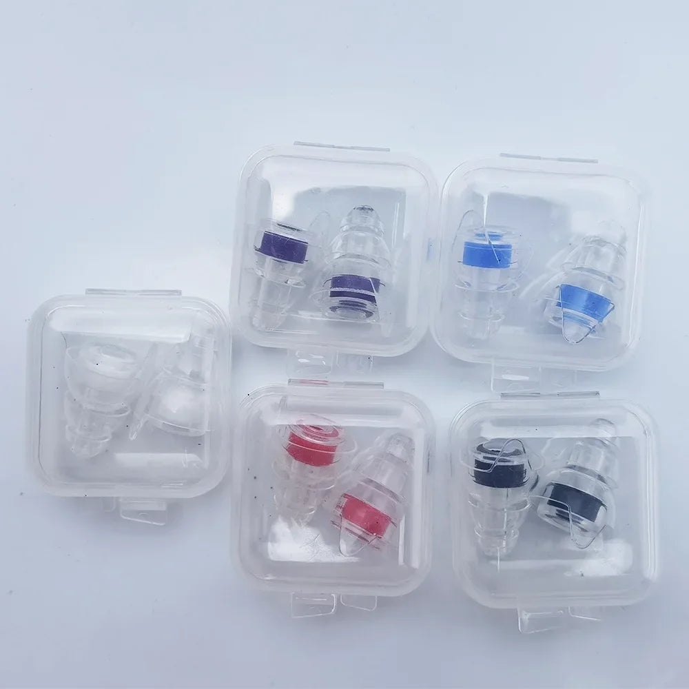 Several pairs of silicone earplugs are shown inside clear plastic storage cases.