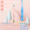 A set of four colorful replaceable brush heads and a blue electric toothbrush for kids displayed on a pink background.