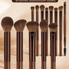 A collection of 13 pieces of brushed aluminum makeup brush sets displayed vertically.