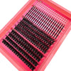 A pink tray of manga lash clusters with bottom and spikes for DIY eyelash extensions.