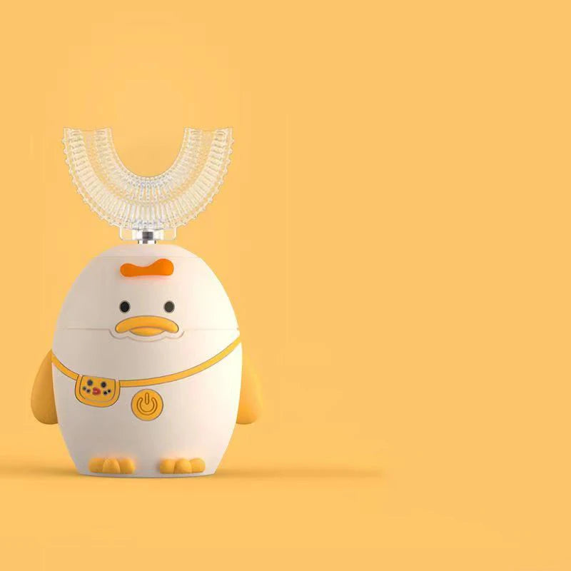 A white duck-shaped electric toothbrush with a clear silicone head and yellow accents.