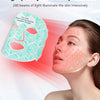 A woman is using a high purity LED lamp beadst face mask to illuminate her skin.