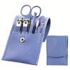 A purple leather pouch containing a stainless steel nail and brow grooming kit with various tools.
