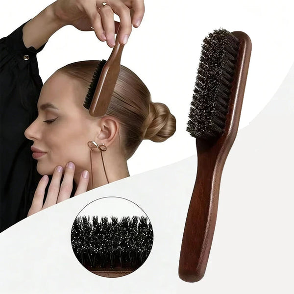 A wooden boar bristle hair brush is shown being used to style a person's hair.