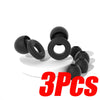 Three black silicone noise-canceling earplugs are displayed on a white surface.