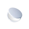 A round, white portable magnifying makeup mirror with a hinged lid.