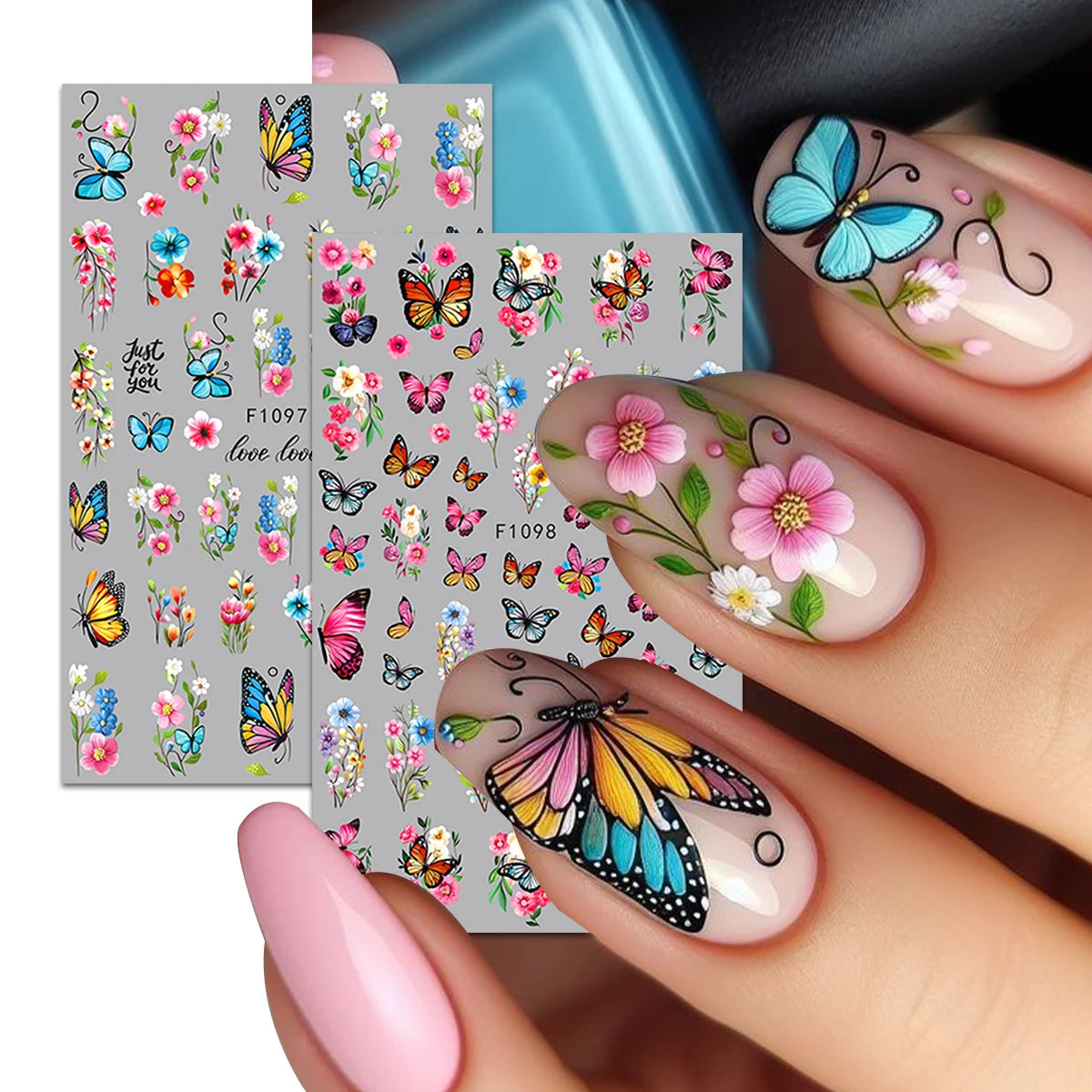 A hand displays fingernails decorated with floral and butterfly nail stickers for DIY decoration.