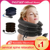 A woman is using a black inflatable cervical spine relaxation neck pillow for pain relief.