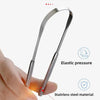 A hand holds a stainless steel U-shaped scraping tool designed for shaving, demonstrating elastic pressure and a secure grip.