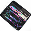 A black case holds a set of professional stainless steel hairdressing scissors and a comb.