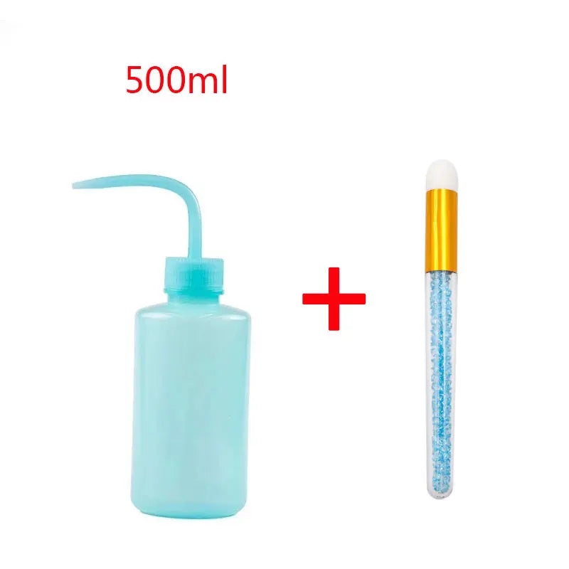A light blue cleaning bottle for eyelash extensions with a precision applicator brush and a 500ml volume marker.
