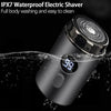 A black electric shaver is shown being washed under water, highlighting its IPX7 waterproof feature.