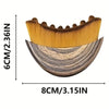 A wooden face brush with a contoured shape and yellow bristles, measuring 8cm long.