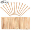 Un ensemble de bâtons de dépilation naturels en bois pour sourcils et cheveux