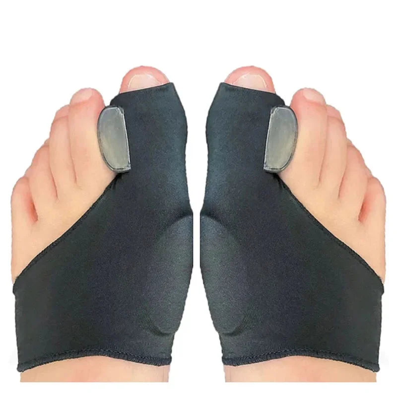 A pair of black orthopedic toe separator and bunion corrector pads shown on human feet.