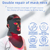 A person is wearing a black multi-wavelength LED face therapy mask designed for double repair of the mask neck.