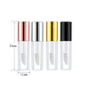 A set of four clear lip gloss tubes with varying colored caps, showing the empty containers for DIY cosmetics.
