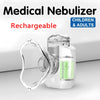 A white portable rechargeable medical nebulizer device with a clear mouthpiece is shown on a white surface.
