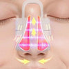 A close-up of a microcurrent nose lifter and sculpting tool being used on the bridge of a person's nose.